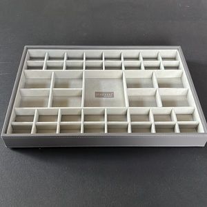 Stackers jewelry organizer from the Container Store.